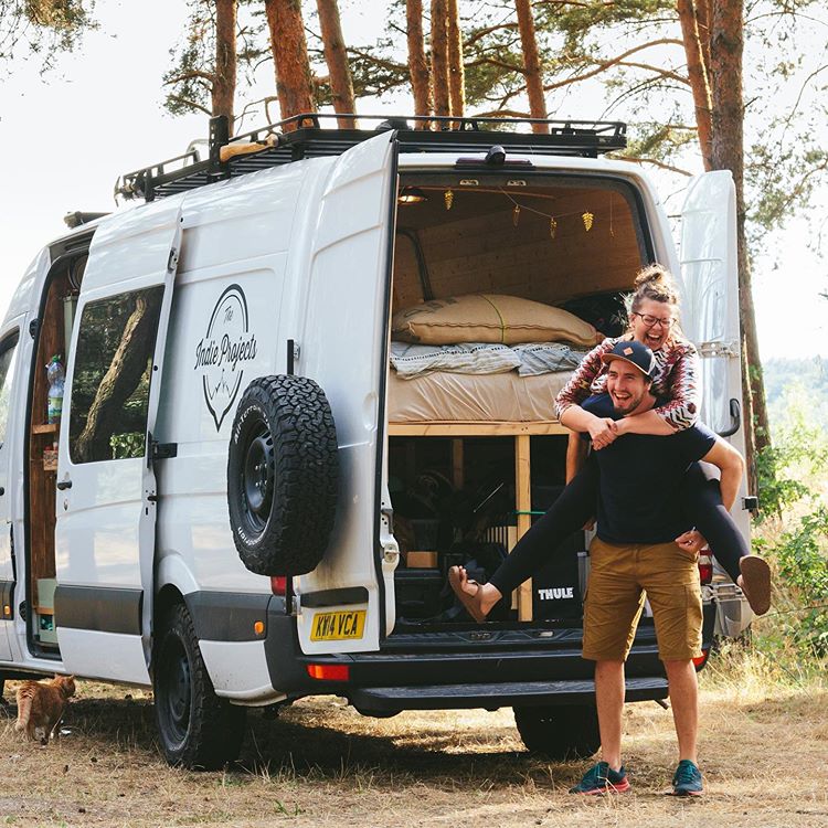 the indie projects van life bloggers stood behind their van